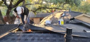 man installing roof